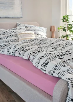 Ropa de cama con notas de música