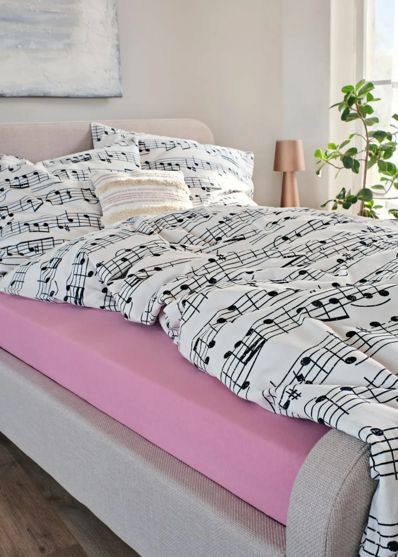 Ropa de cama con notas de música