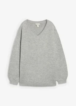 Suave jersey de punto fino con mangas abullonadas