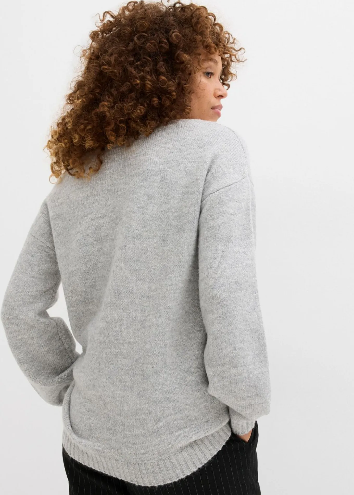 Suave jersey de punto fino con mangas abullonadas