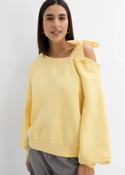 Sudadera ancha con un hombro al descubierto