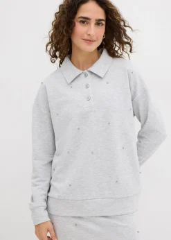 Sudadera con tachuelas