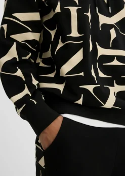 Sudadera de algodón orgánico con corte holgado y capucha