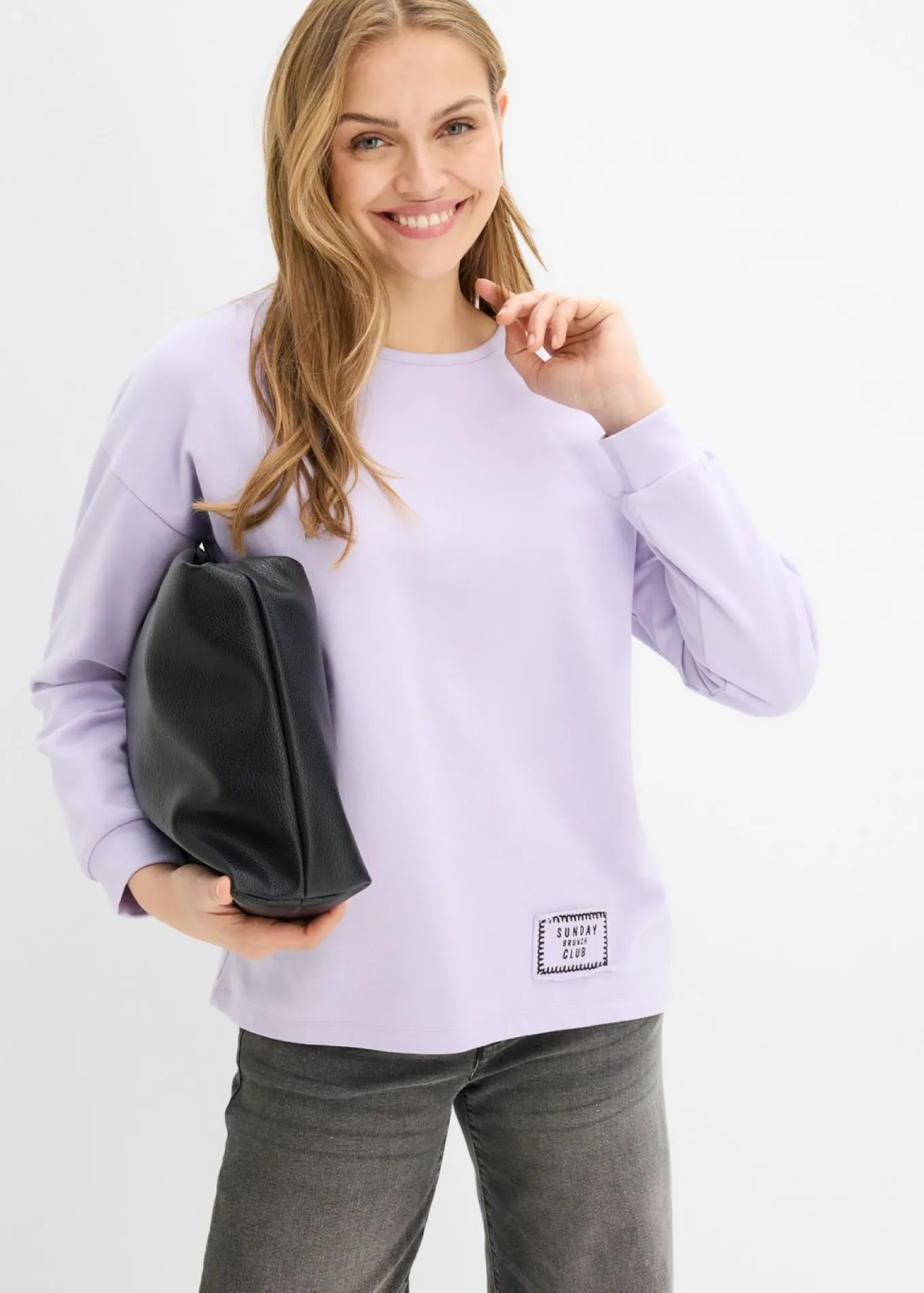 Sudadera de mezcla de algodón con bajo asimétrico