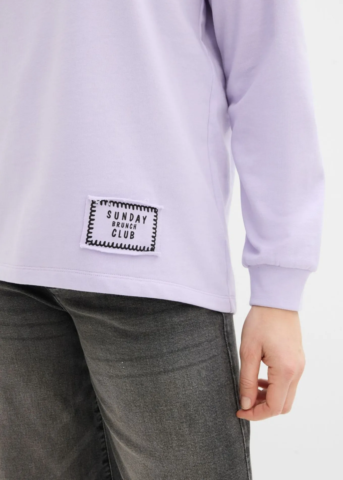 Sudadera de mezcla de algodón con bajo asimétrico