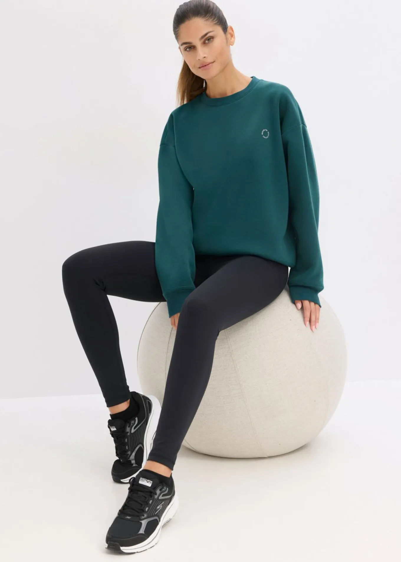 Sudadera térmica de material de secado rápido con corte holgado