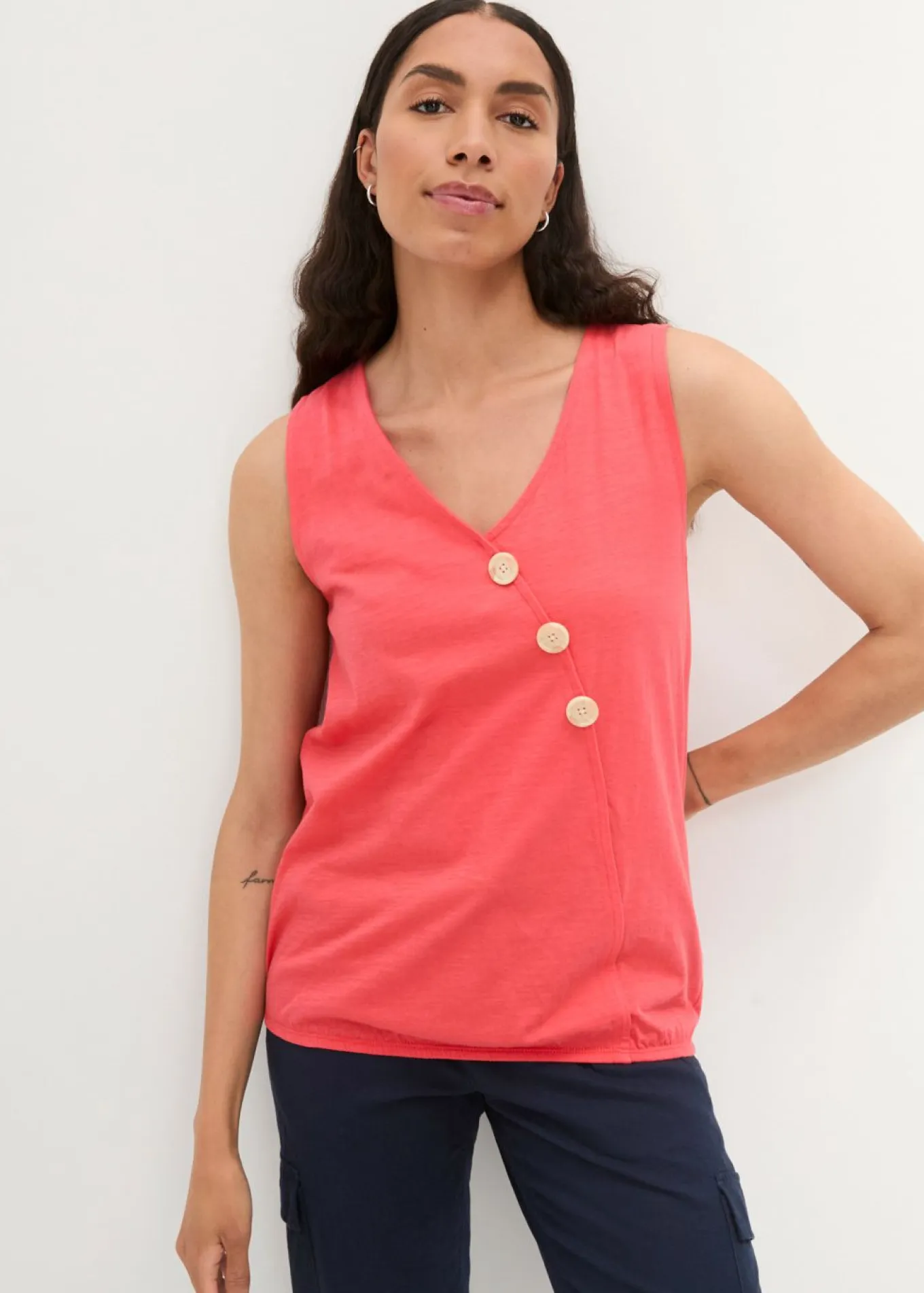 Top de algodón con diseño cruzado y cintura elástica