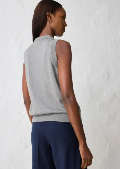 Top de punto fino con contenido de seda y cuello tipo polo