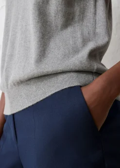 Top de punto fino con contenido de seda y cuello tipo polo