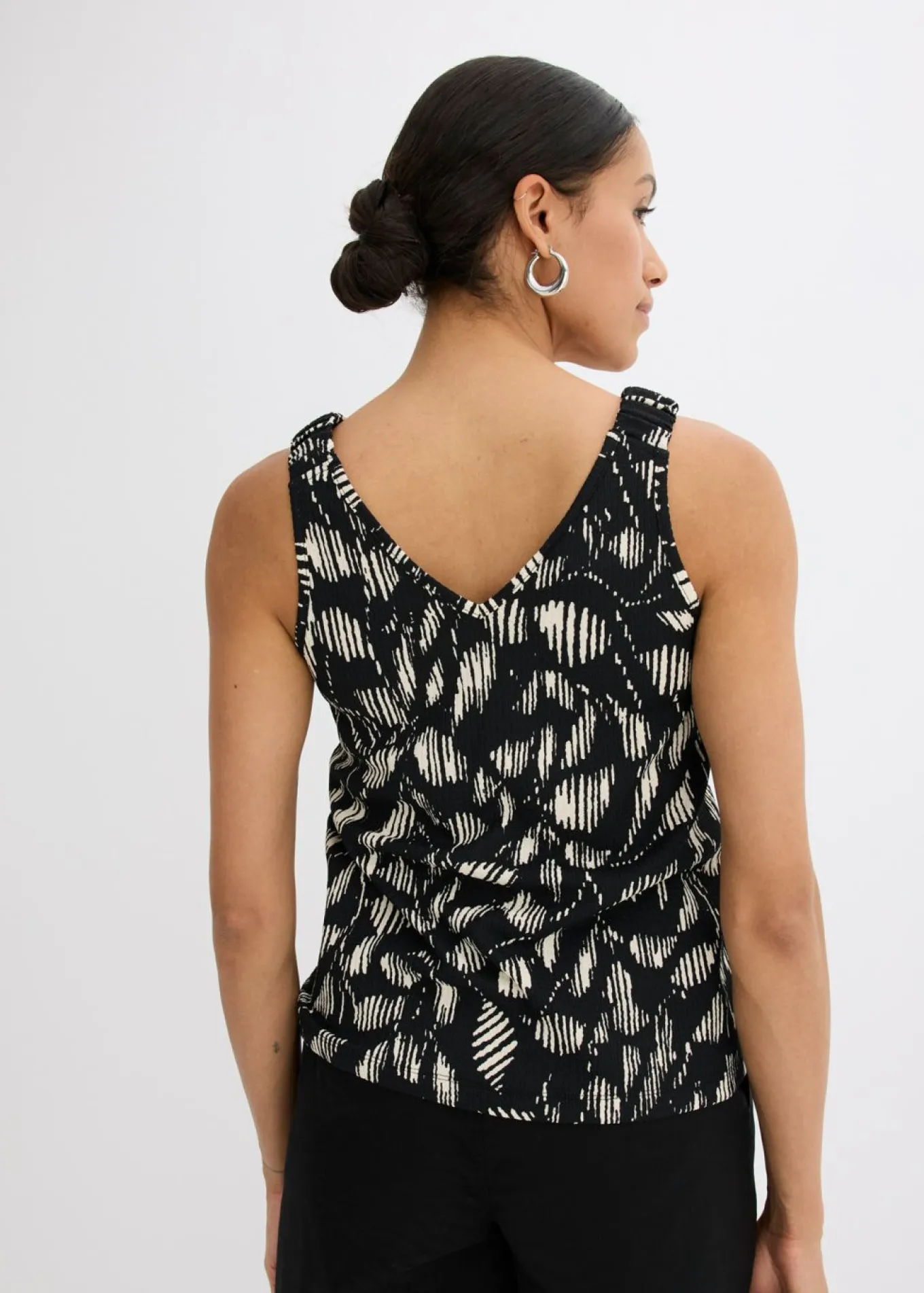 Top estampado de punto estructurado