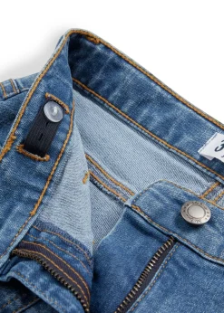 Vaqueros acampanados con talle medio y cinturilla cómoda