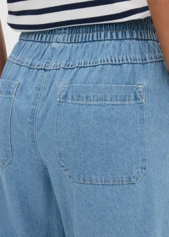 Vaqueros anchos de talle medio con cinturilla cómoda