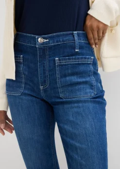 Vaqueros bootcut, high waist, largo completo y elásticos