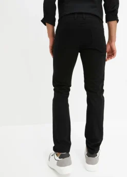Vaqueros con corte slim y forma recta