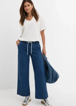 Vaqueros con pernera ancha, mid waist, elásticos