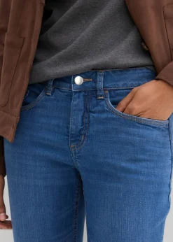 Vaqueros de algodón orgánico con corte slim y talle medio