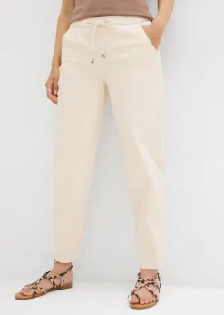 Vaqueros de corte barrel, mid waist, cintura cómoda