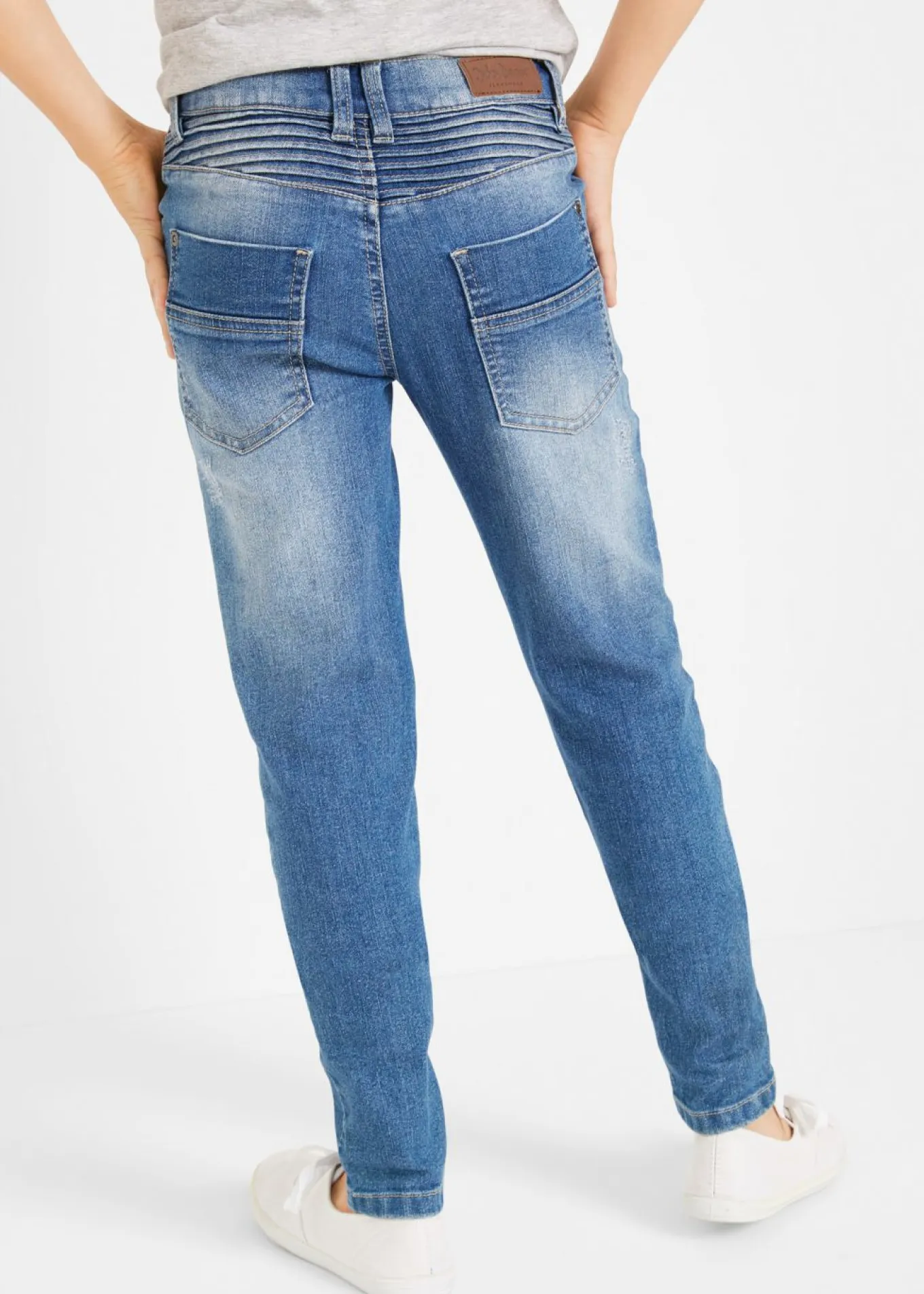 Vaqueros elásticos con cintura ajustable y corte pitillo/recto