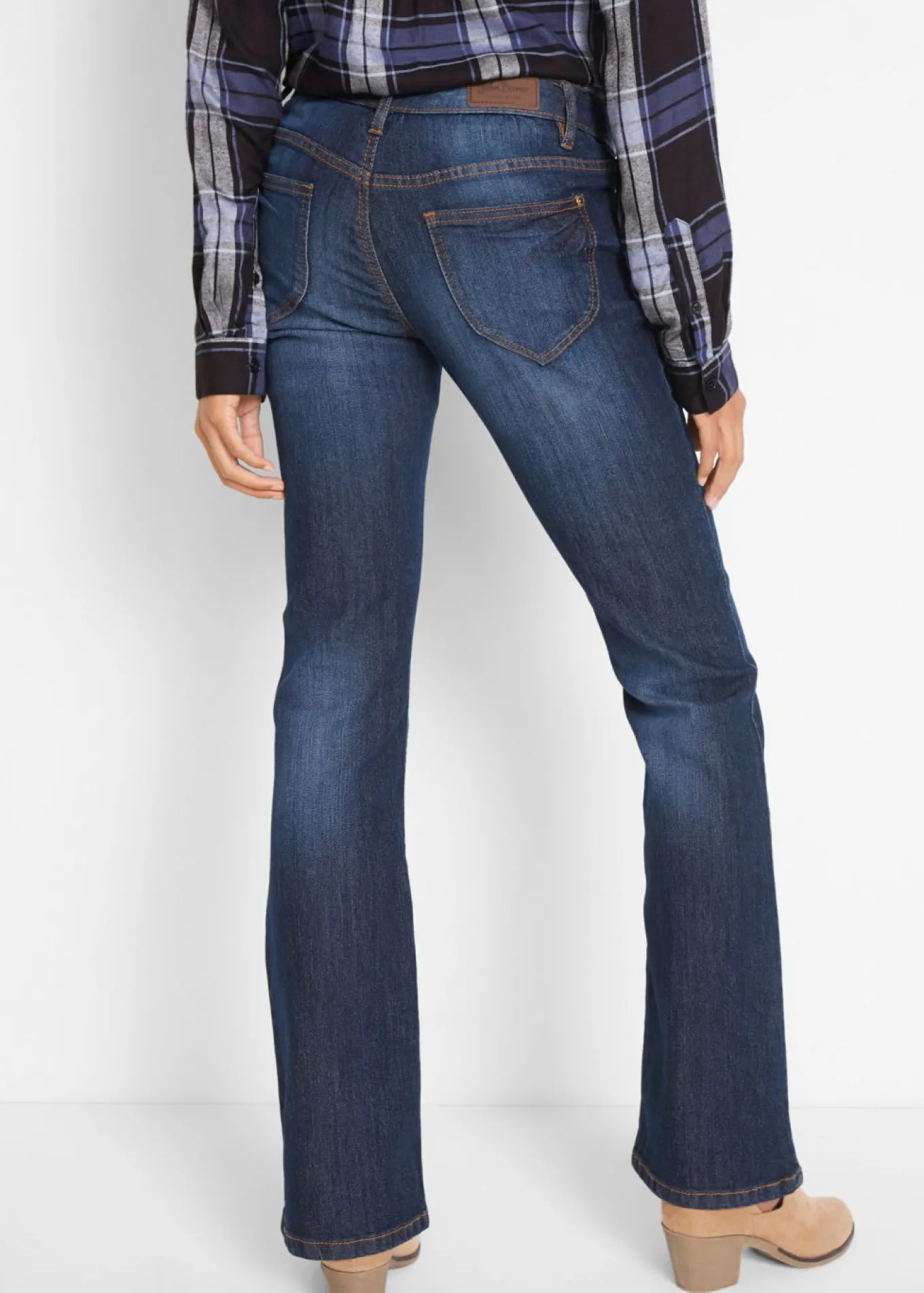 Vaqueros elásticos con corte bootcut y talle medio