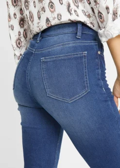 Vaqueros elásticos con talle medio y corte slim