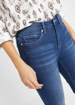 Vaqueros elásticos con talle medio y corte slim