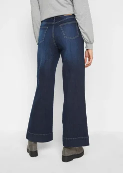 Vaqueros elásticos de pernera ancha y cintura media