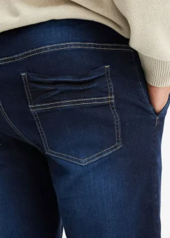 Vaqueros informales con corte regular, forma tapered y cinturilla elástica