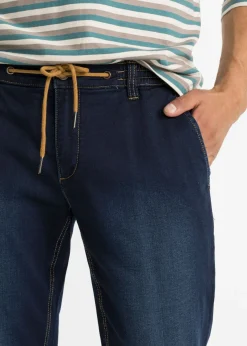 Vaqueros informales con corte regular, forma tapered y cinturilla cómoda