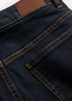 Vaqueros largos con corte mom y talle medio