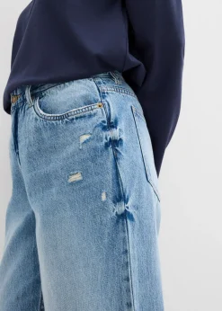 Vaqueros low stretch con perneras anchas y tiro medio