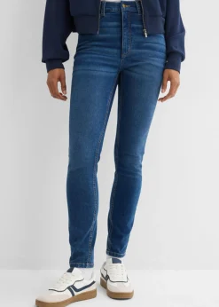 Vaqueros pitillo con talle medio y cinturilla cómoda