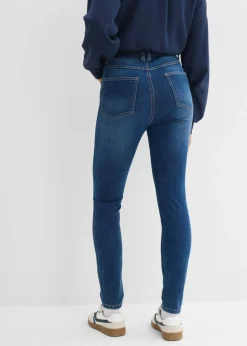 Vaqueros pitillo con talle medio y cinturilla cómoda