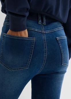 Vaqueros pitillo con talle medio y cinturilla cómoda