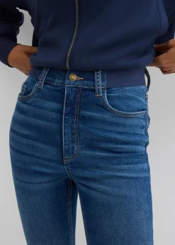Vaqueros pitillo con talle medio y cinturilla cómoda