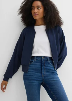 Vaqueros pitillo con talle medio y cinturilla cómoda
