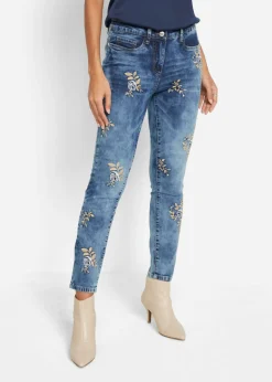 Vaqueros slim fit, con bordado de flores