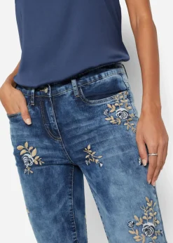 Vaqueros slim fit, con bordado de flores