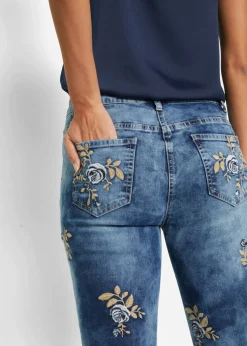 Vaqueros slim fit, con bordado de flores