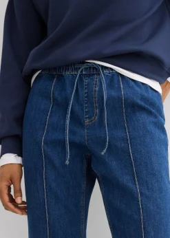 Vaqueros tipo bootcut con talle medio y cinturilla cómoda