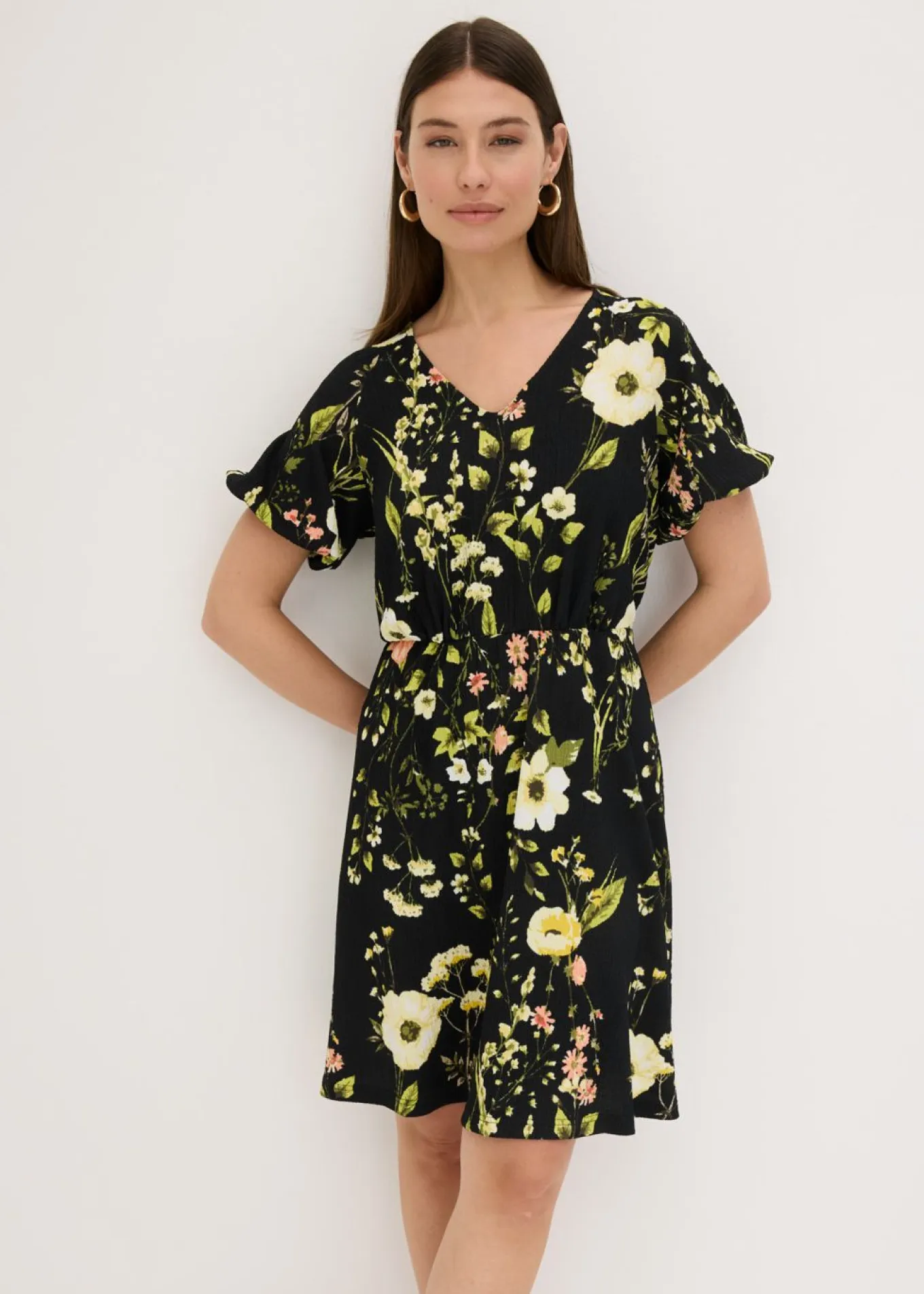 Vestido con mangas abullonadas