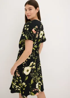 Vestido con mangas abullonadas