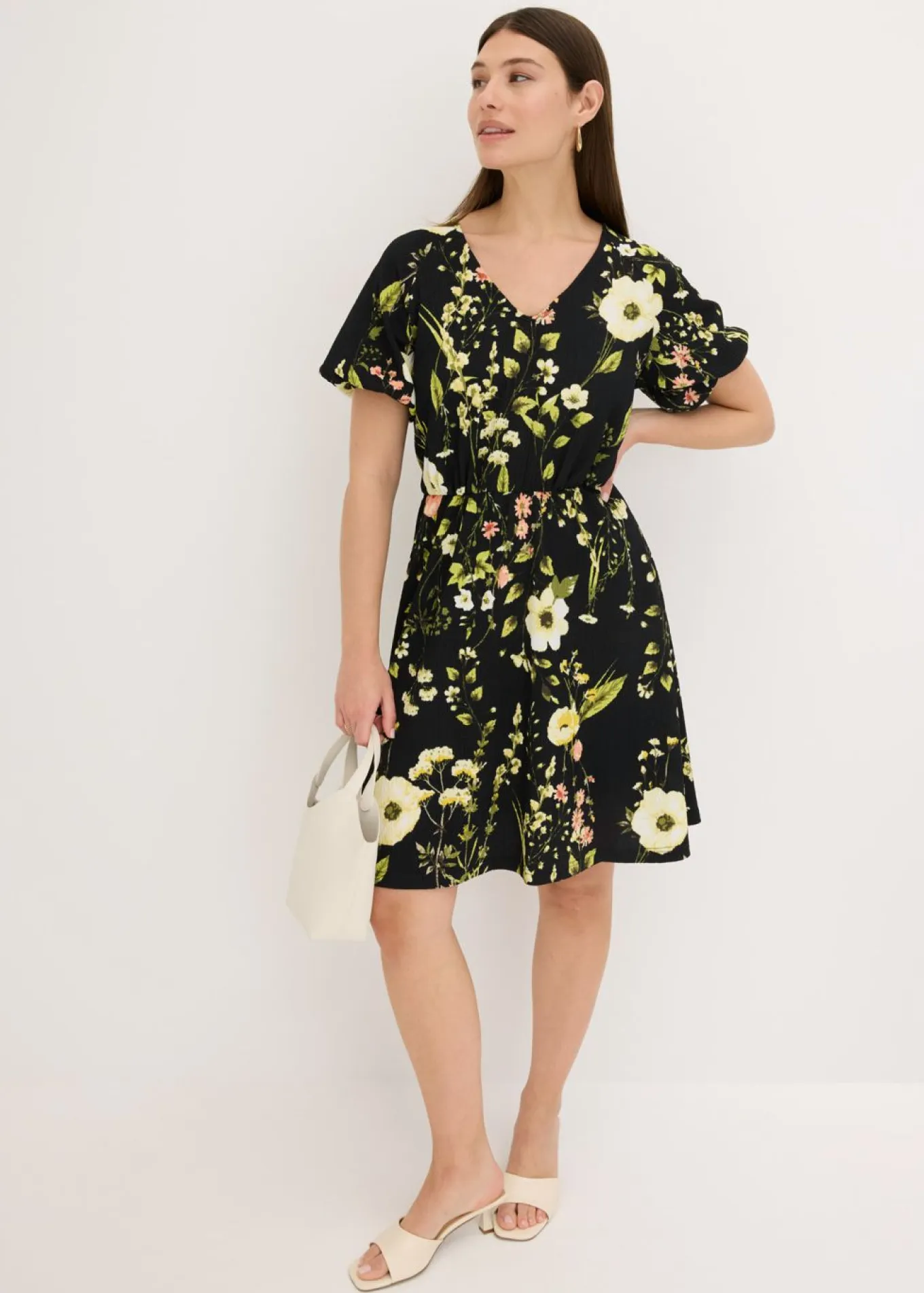 Vestido con mangas abullonadas