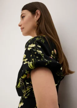 Vestido con mangas abullonadas