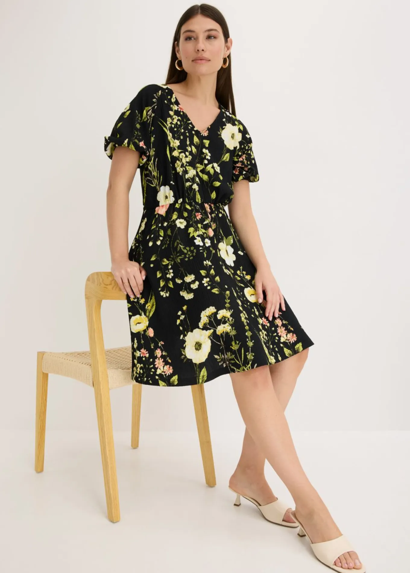 Vestido con mangas abullonadas