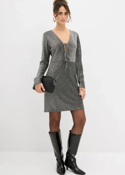 Vestido corto con material brillante y detalle de lazo