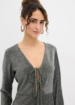 Vestido corto con material brillante y detalle de lazo