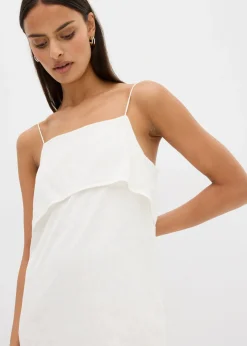 Vestido corto con un bonito bordado de lentejuelas