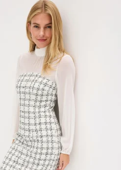 Vestido corto de bouclé con mangas de gasa
