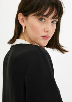 Vestido corto de neopreno con cuello alto
