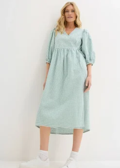 Vestido cruzado de material estructurado
